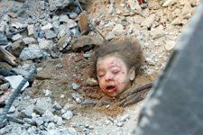 Gaza-Kid-inrubble.jpg